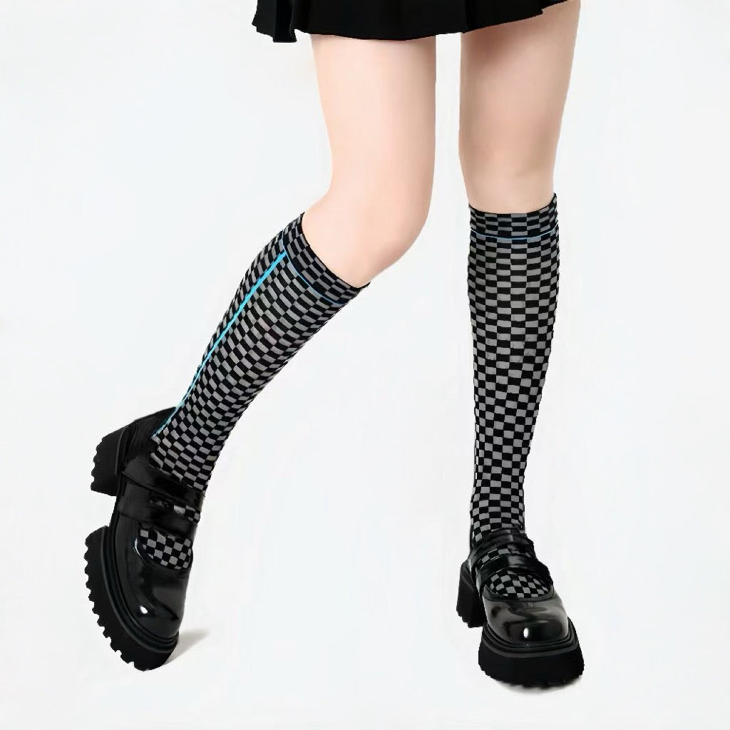 Model wearing a pair of Checkered Knee-high Socks, great for daily wear and lounging.