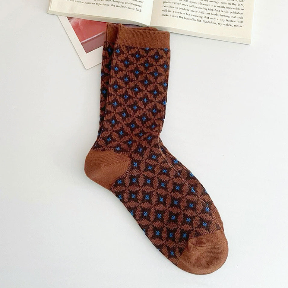 Close-up of Old Memory Socks in brown , easy to pack for travel and errands.