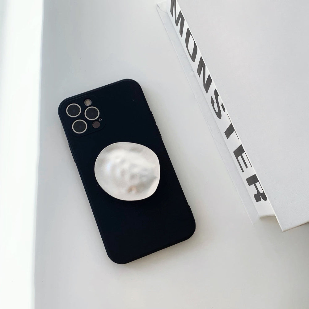 Front view of black Solid Color Case. Polished minimalist design featuring a versatile built-in kickstand.