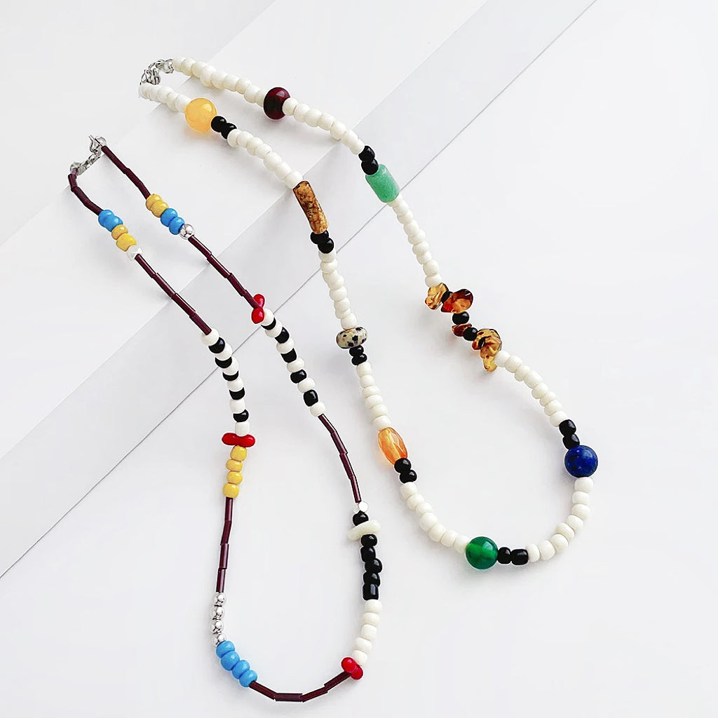 Folded view of two colors of Vivid Hue Beads Necklaces, ideal for date nights.