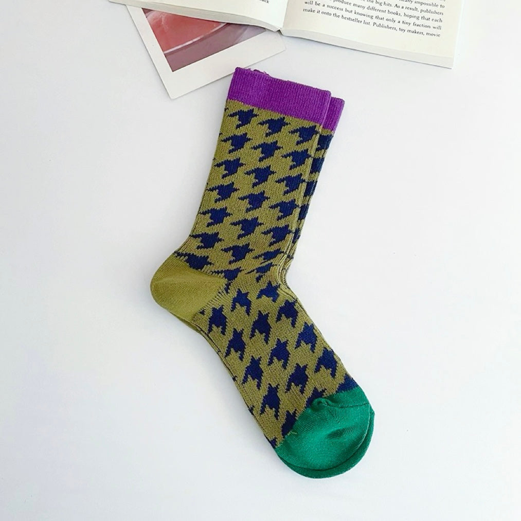 Close-up of Wild Birds Socks, easy to pack for travel and errands.