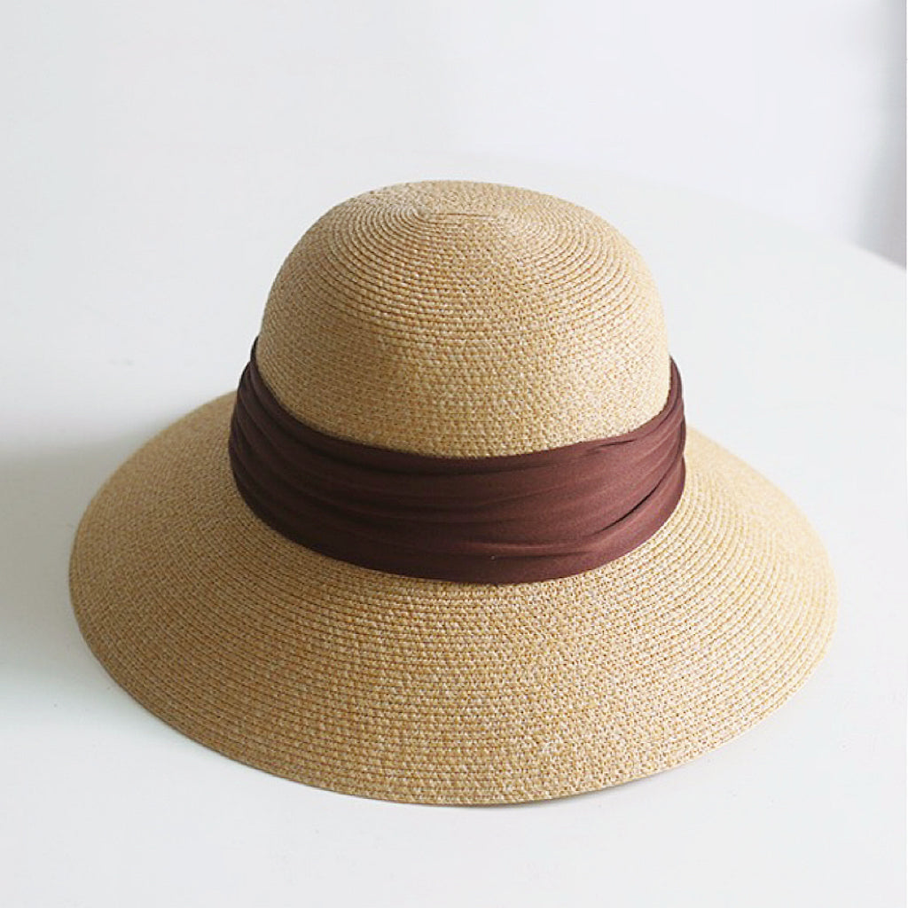 Sun protective foldable straw hat with ribbon