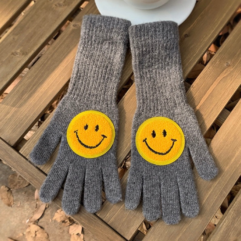 Handschuhe mit rundem Lächeln