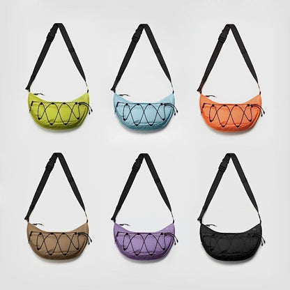 A grid display of airy nylon crescent sling bags in mustard, blue, orange, brown, purple, and black.