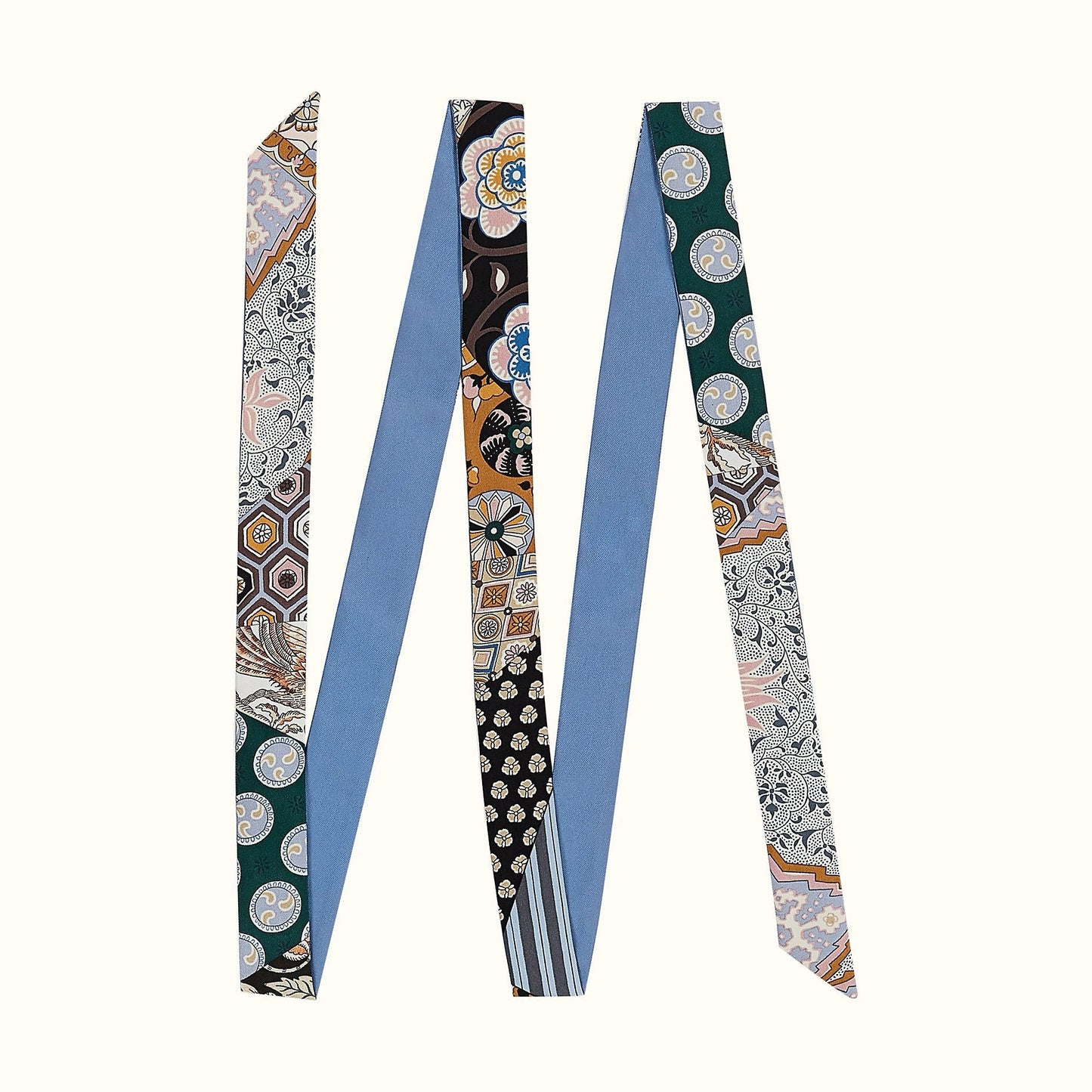Angled view of Artistic Print Skinny Scarf in blue, great for office layering and commuting.