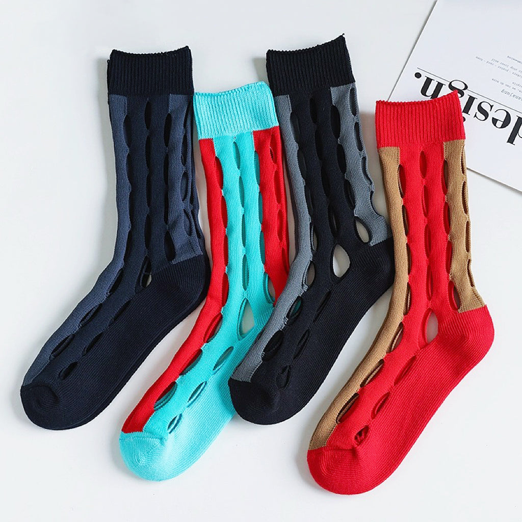 Front view of 4 pairs of Bold Hollow Socks, easy to pack for travel and errands.