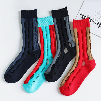 Front view of 4 pairs of Bold Hollow Socks, easy to pack for travel and errands.