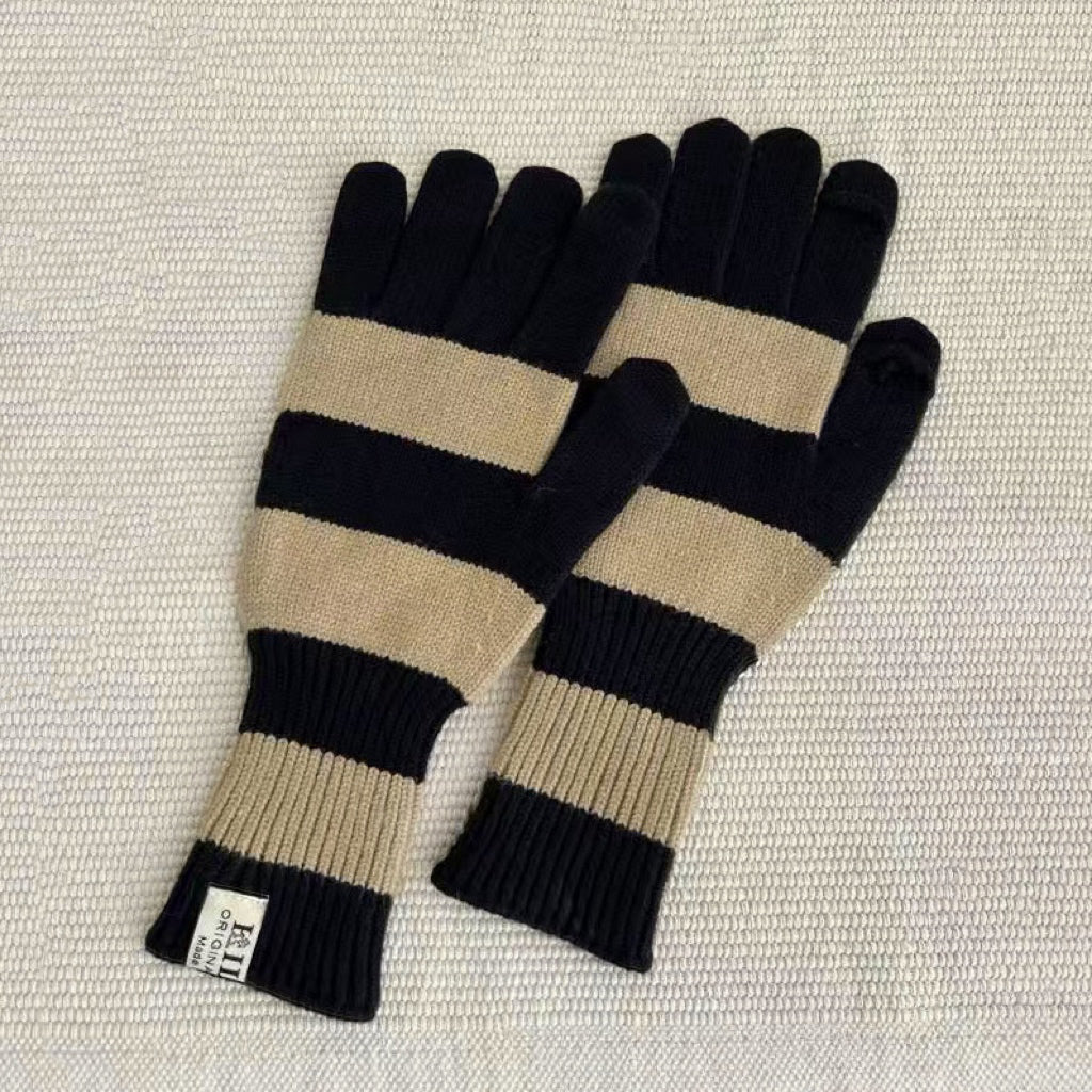 Bold stripe knit gloves in black and khaki with ribbed cuffs; warm accessory for winter commuting.