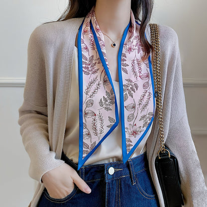 Model wearing a silk scarf in blue, easy for weekend styling and gifting.