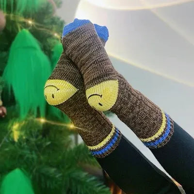 Brown textured knit socks with a yellow smiley heel, offering ultimate comfort and joy