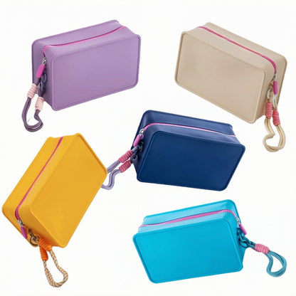 Large size candy-colored travel pouches scattered on a neutral background emphasizing the 5 available color options.