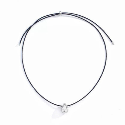 Flat lay of Celestial Drop Pendant Necklace in Silver, premium Jewelry for modern women earrings.