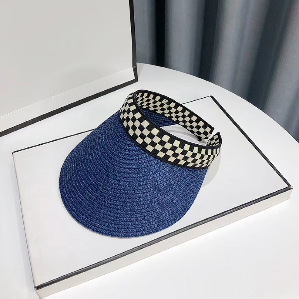 Front view of blue Checkered Band Straw Visor Hat. Trendy foldable sunhat with checkered accent.