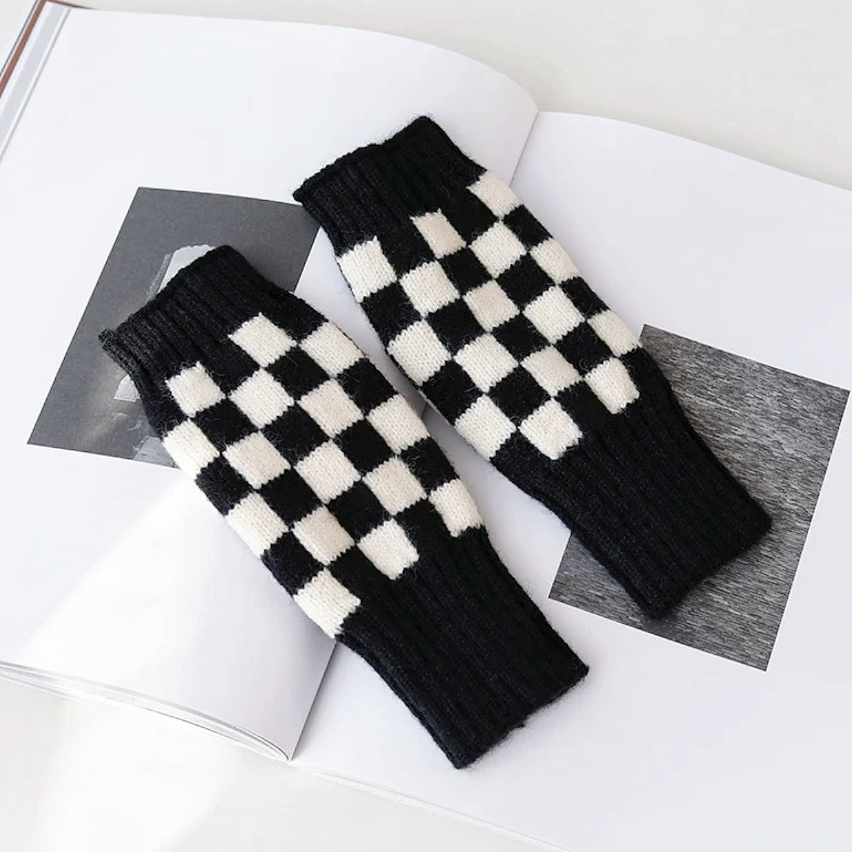 Black and white checkered knit gloves; timeless design perfect for retro-themed winter street styling.