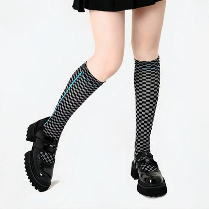 Model wearing a pair of Checkered Knee-high Socks, great for daily wear and lounging.