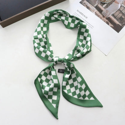 Close-up of Checkered Silk Like Skinny Scarf in green, ideal for everyday styling and weekend outings.