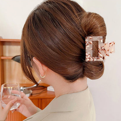 Model wearing Color Square Hair Claw in coffee, easy for workdays and special occasions.