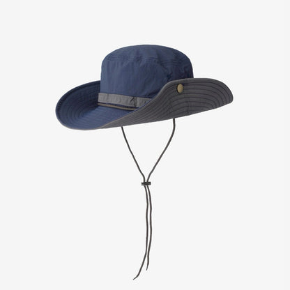 Product shot of the navy blue bucket hat with its chin strap.