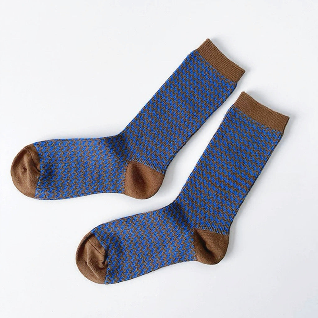 Front view of Colored Houndstooth Socks in blue, easy to pack for travel and errands.