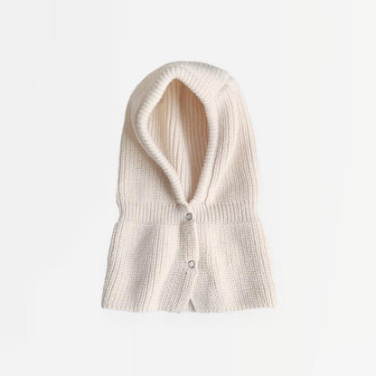 Front view of beige balaclava hat with multi-tone patterns, offering a sophisticated winter headwear look.
