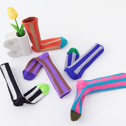 Front view of Five colors of contrast color striped socks in various vibrant hues.