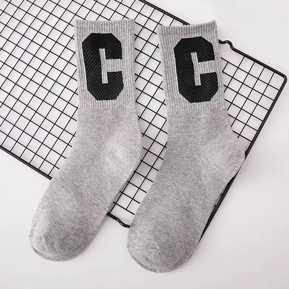 Close-up of Cool C Socks in gray, ideal for workouts and commuting.