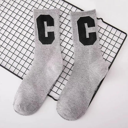 Close-up of Cool C Socks in gray, ideal for workouts and commuting.