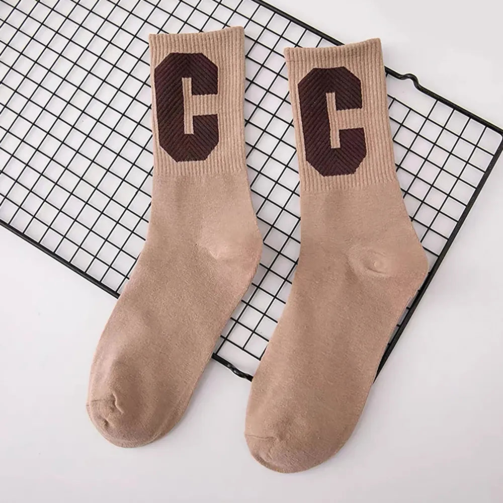 Front view of Cool C Socks in khaki, easy to pack for travel and errands.