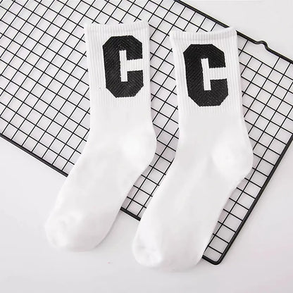 Angled view of Cool C Socks in white, great for daily wear and lounging.