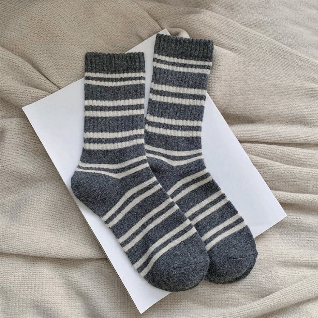 Front view of Cozy Wool Striped Socks in gray, easy to pack for travel and errands.