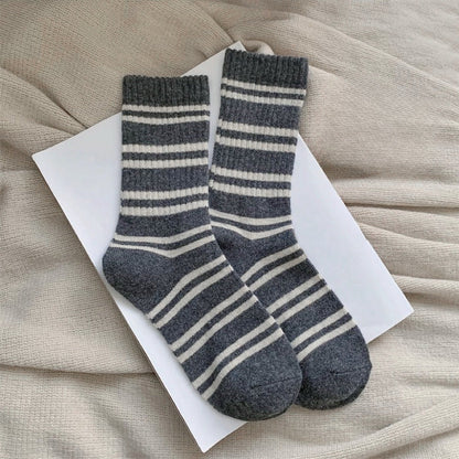 Front view of Cozy Wool Striped Socks in gray, easy to pack for travel and errands.
