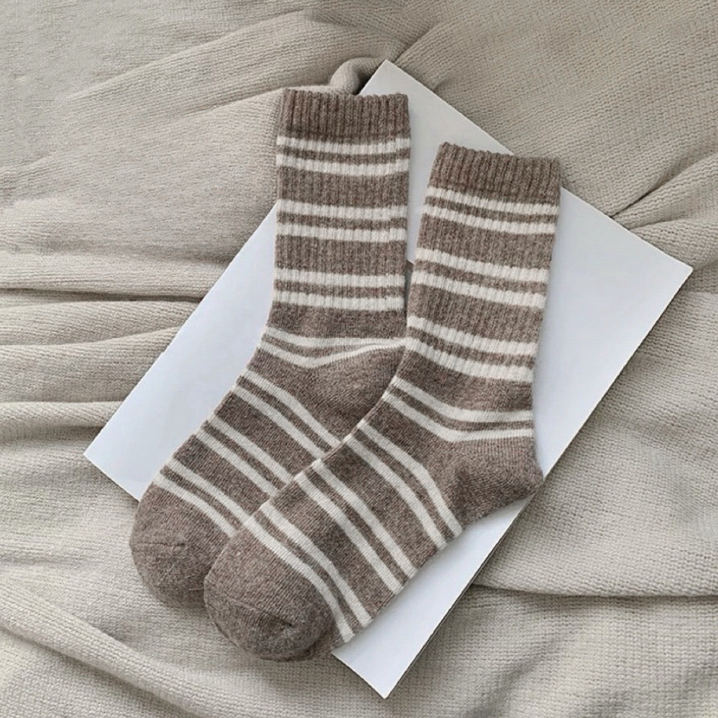 Folded view of Cozy Wool Striped Socks in camel, ideal for workouts and commuting.
