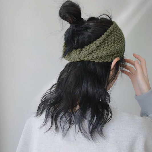 Model wearing a Crochect Bow Headband in green, ideal for quick updos and ponytails.