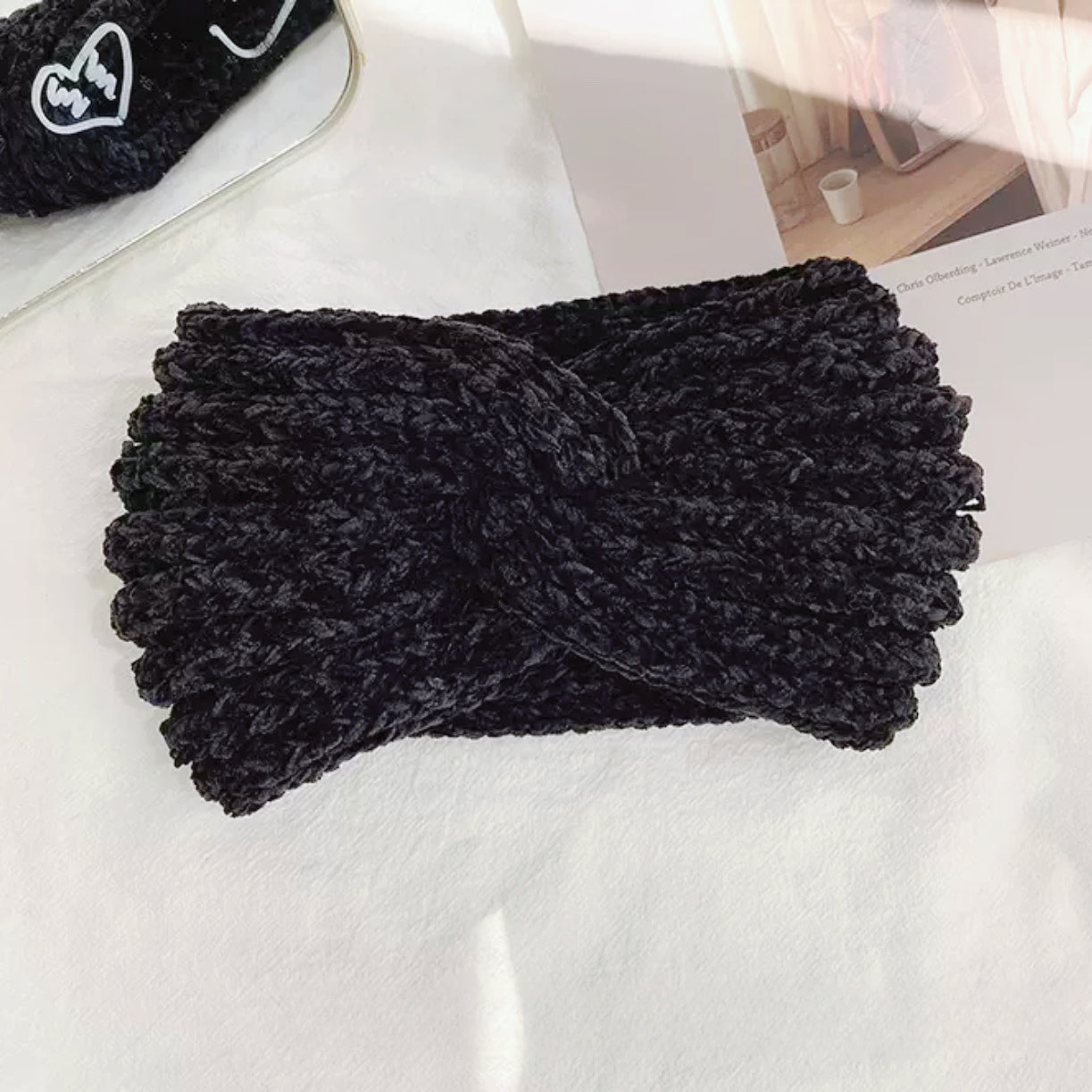 Flat lay of Crochet Velvet Twist Headband in black, great for everyday styling and gifting.