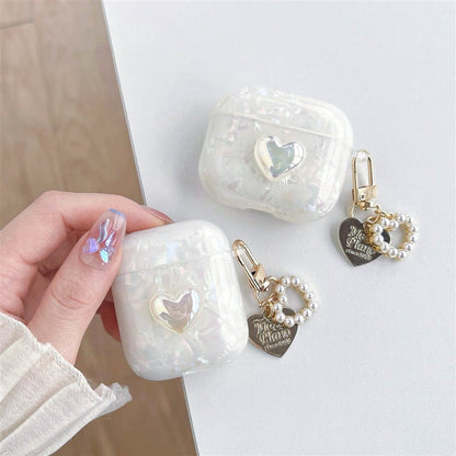 Model Hands holding a Crystal Shell AirPods Case Cover, great for daily use and protection.