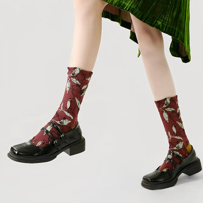 Model wearing a pair of Dancing Flower Socks, easy to pack for travel and errands.