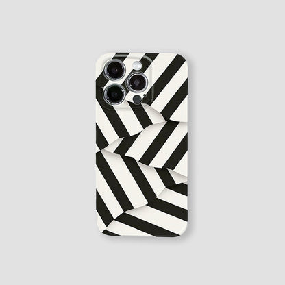 White silicone iPhone case with bold black diagonal stripes. Modern 3D geometric pattern for a sleek look.