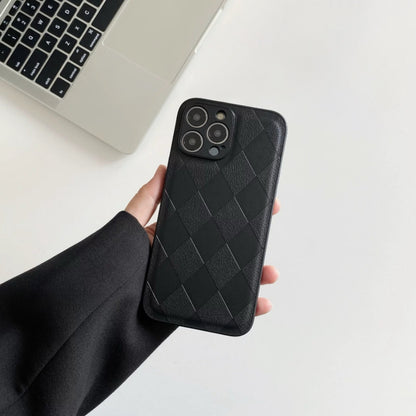 Model holding black Diamond Pattern Leather Case. Elegant embossed diamond-quilt for Old Money style.