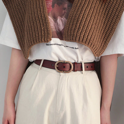 Model wearing brown Double C Lady's Belt, casual fashion for jeans matching