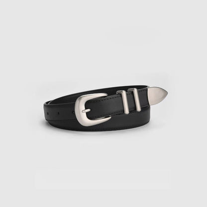 Close-up view of the black leather belt showing the vintage silver pointed buckle and double keeper loops.