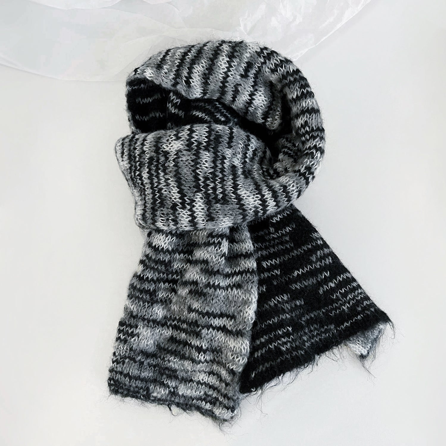 Close-up of Dual-Sided Aurora Texture Soft Scarf in gray and black, great for office layering and commuting.