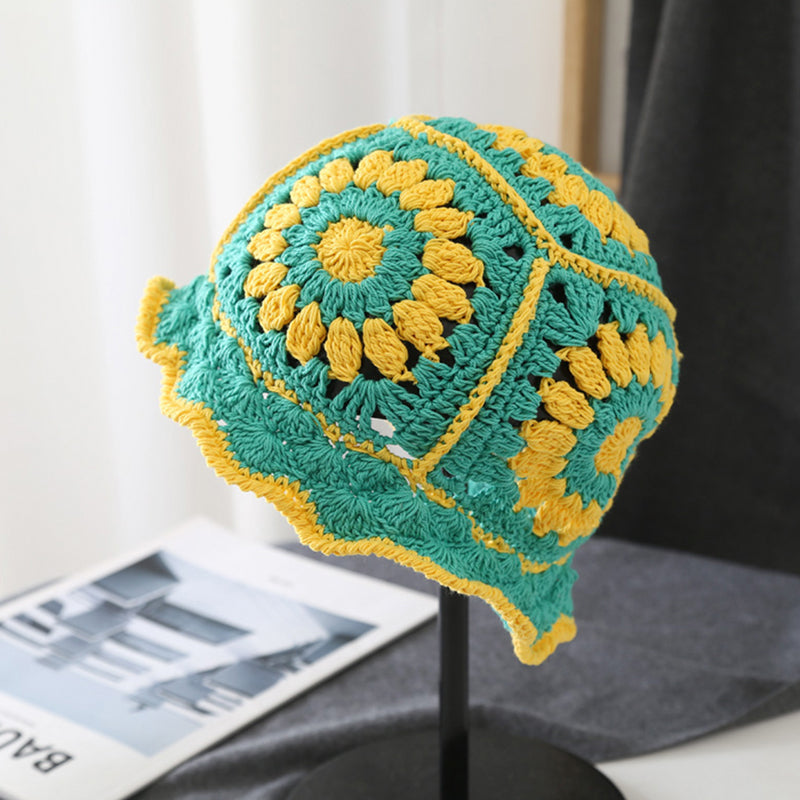 Front view of green Floral Crochet Hat. Breathable and soft accessory for a trendy bohemian style.