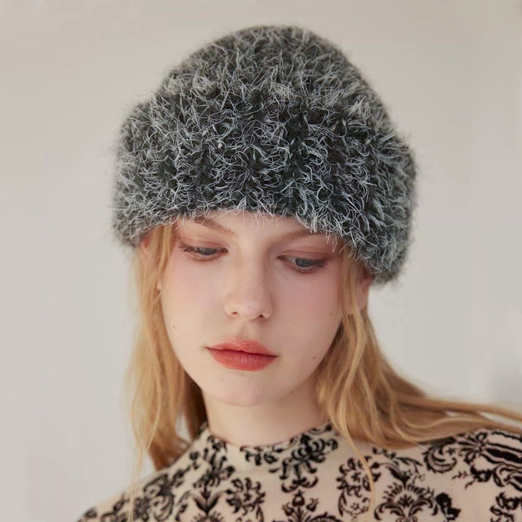 Model wearing black Fluffy Knitted Thick Beanie. Sleek minimalist style with heavy-duty thermal protection.