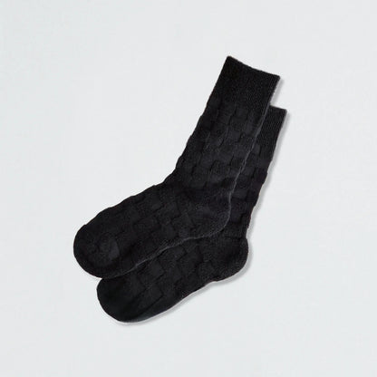 Close-up of Fuzzy Check Textured Socks in black, great for daily wear and lounging.