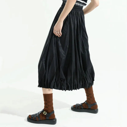 Model wearing a pair of Fuzzy Check Textured Socks in brown, great for daily wear and lounging.