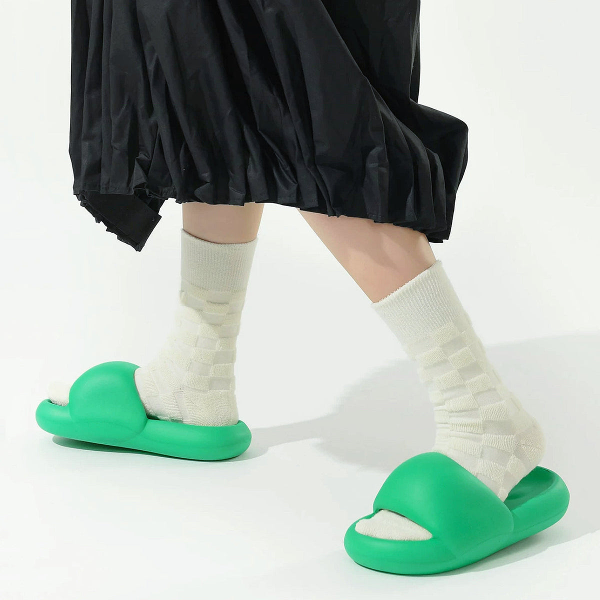 Model wearing a pair of Fuzzy Check Textured Socks in white, ideal for workouts and commuting.