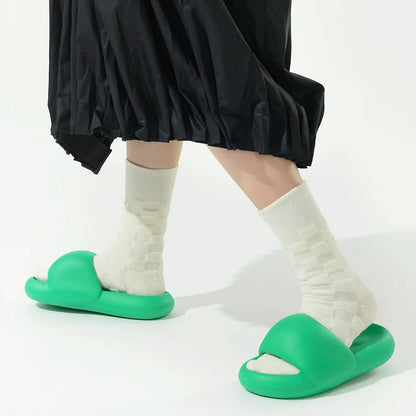 Model wearing a pair of Fuzzy Check Textured Socks in white, ideal for workouts and commuting.