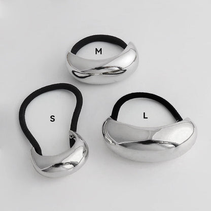 Front view of three silver Gleaming Curve Hair Cuff hair accessory in different sizes.