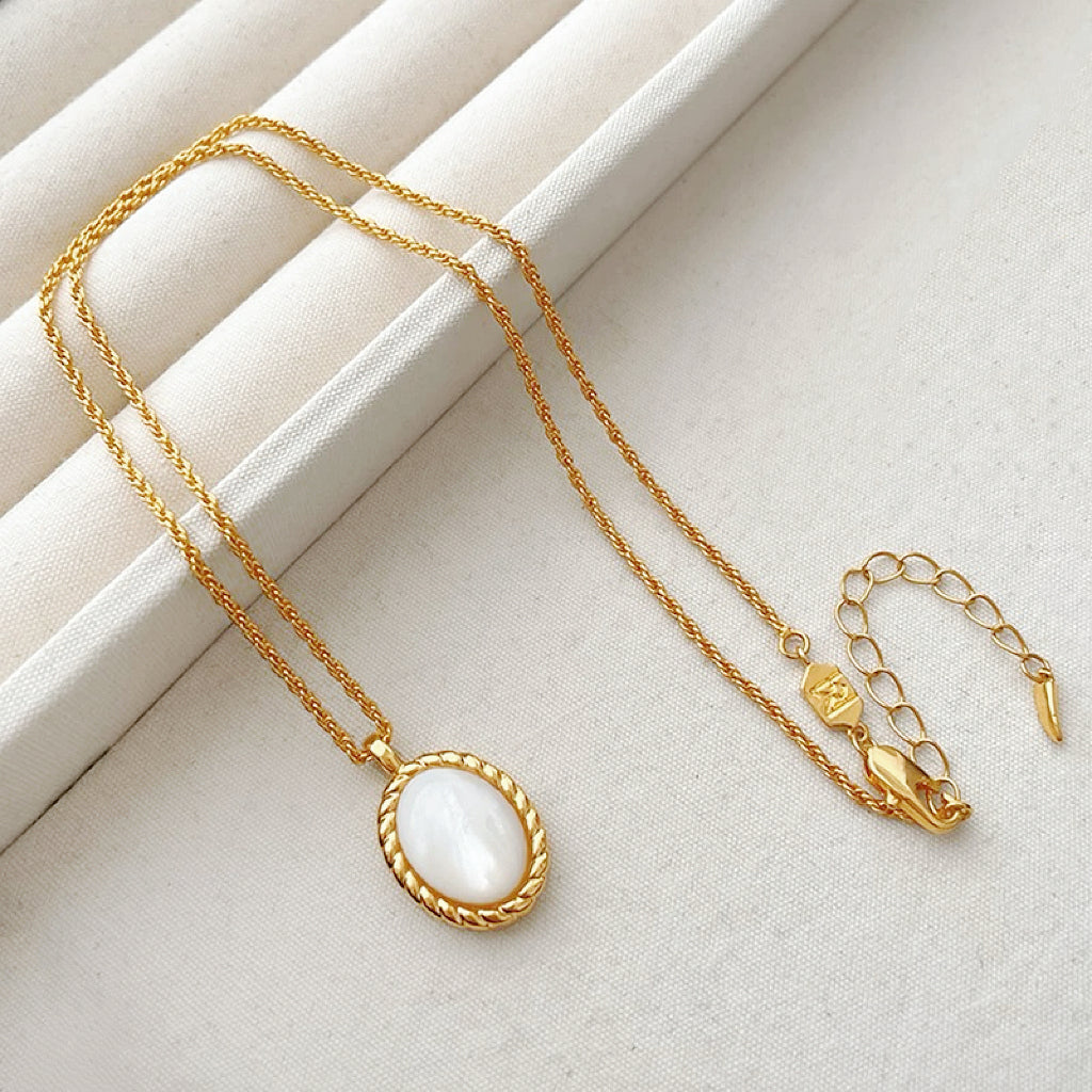 Detailed view of the gold-tone jade necklace on a pure background, great for everyday outfits and gifting.