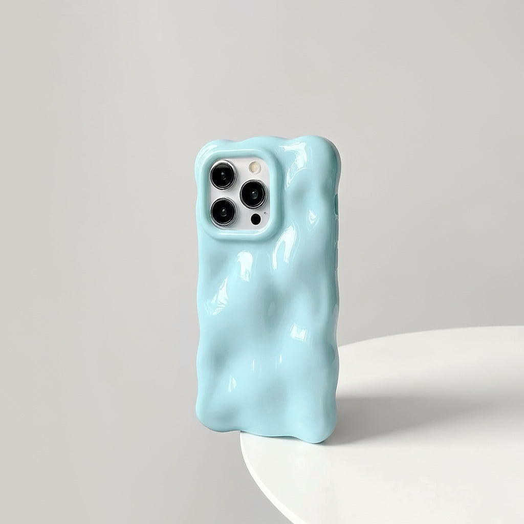 Light blue 3D wavy silicone case with a soft gummy feel, perfect for a fresh aesthetic.